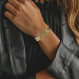 Womens handmade leather bracelet cuff made of soft genuine leather dainty and small with hand stamped fuck in brass plaque high quality and fun accessory bold and perfect for punk rocker style or alternative alt styles or vintage inspo