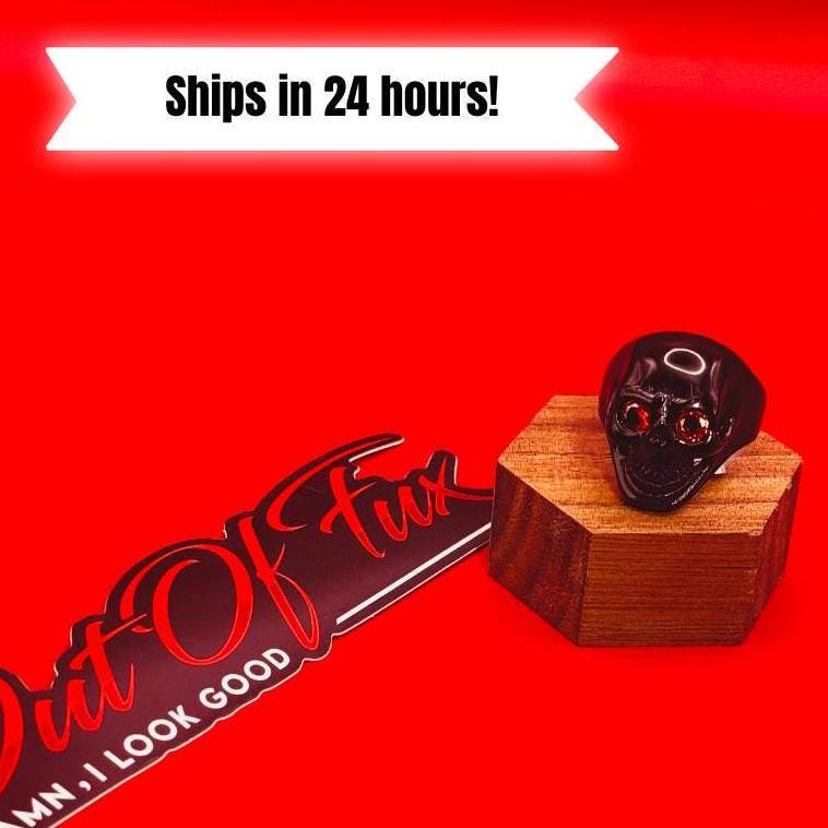 unisex black skull ring red gem eyes bold biker ring perfect gift for him or her durable high quality black plated fast free shipping stainless steel red cz eyed black skull ring top notch stainless steel enduring fiery red cubic zirconia eyes posh dark finish daring edgy vibe polished sterling silver silky smooth comfy to wear unique biker jewelry alternative fashion statement gothic punk rocker ring mens womens